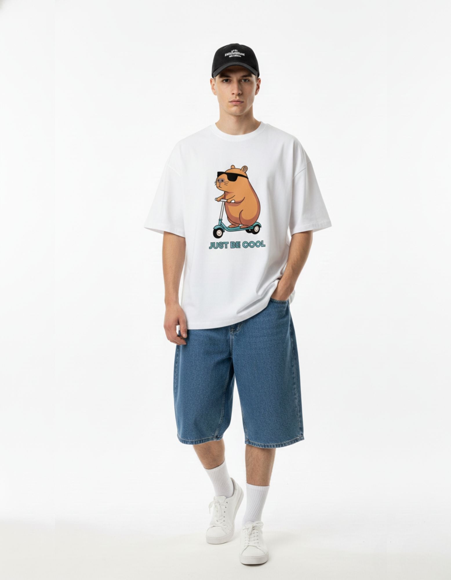 Unisex white baggy t-shirt with a cool capybara riding a scooter print, ideal for relaxed urban fashion in India.