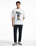 "Front view of white oversized t-shirt for men featuring bold Korean calligraphy and colorful portrait graphic."