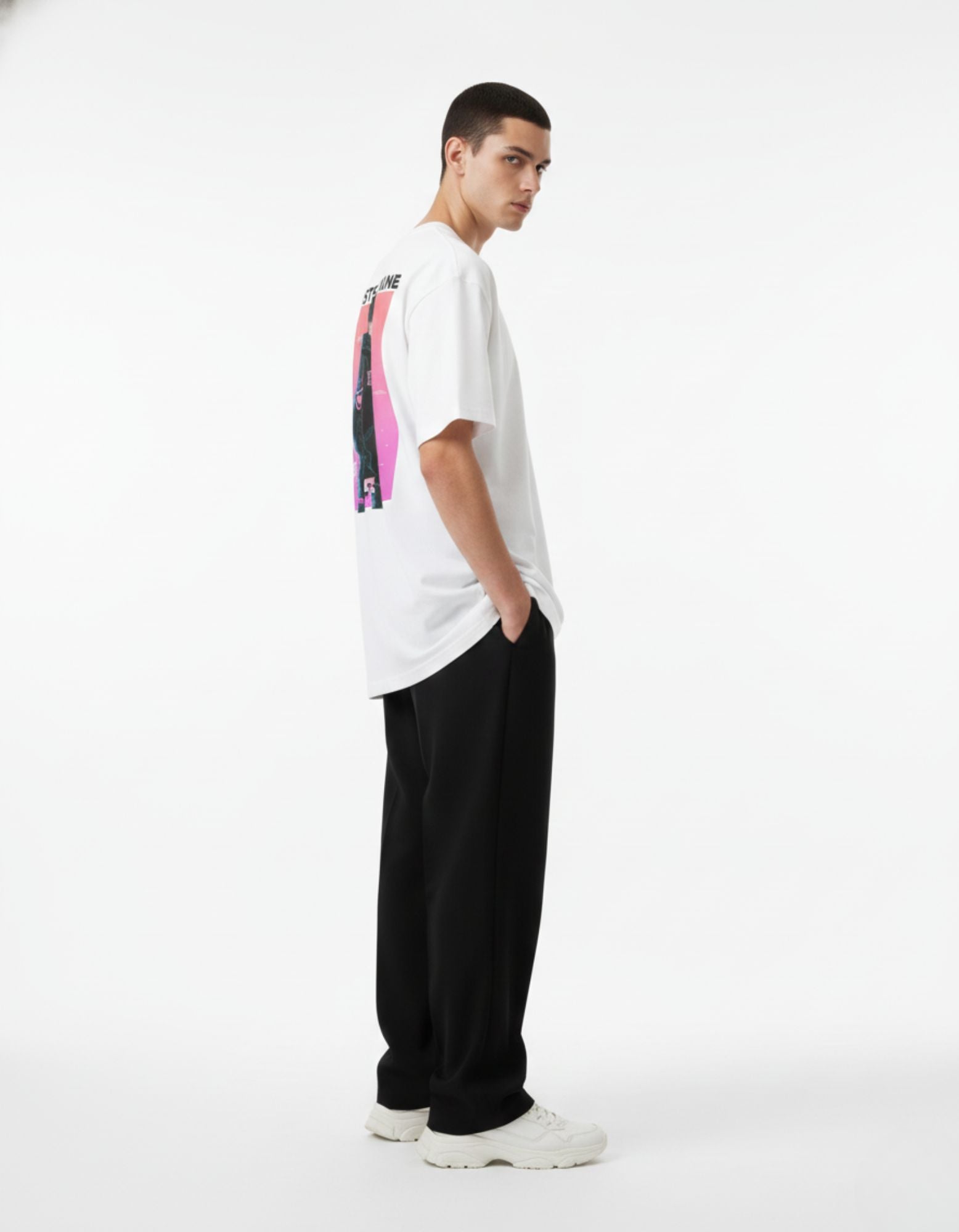 High-quality back shot of a white streetwear t-shirt featuring the ALISTE DAINE anime boy hoodie graphic.