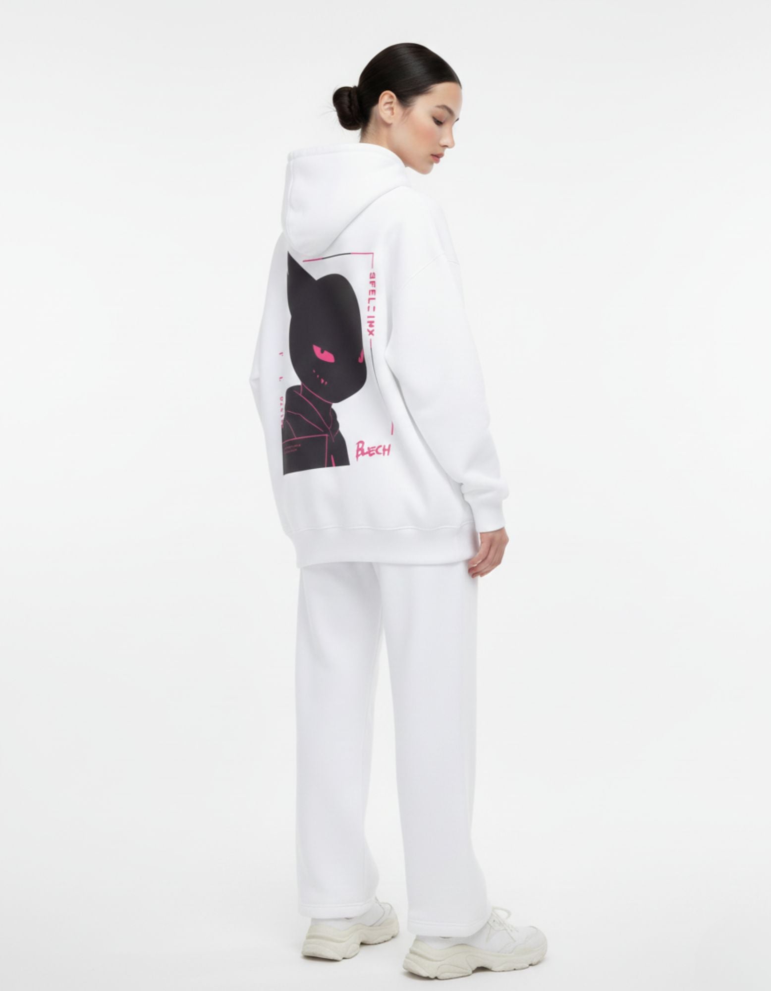 Female model showcasing the detailed pink-eyed anime character graphic on a white oversized heavyweight cotton hoodie from GENZs Fashion.