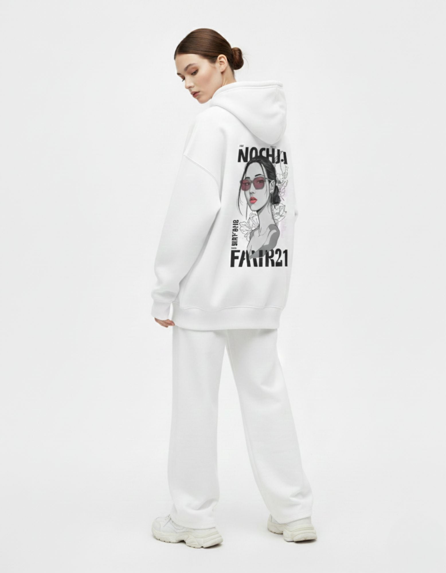 Three-quarter back view of a white aesthetic hoodie showing the high-contrast black graphic design for a modern streetwear vibe.