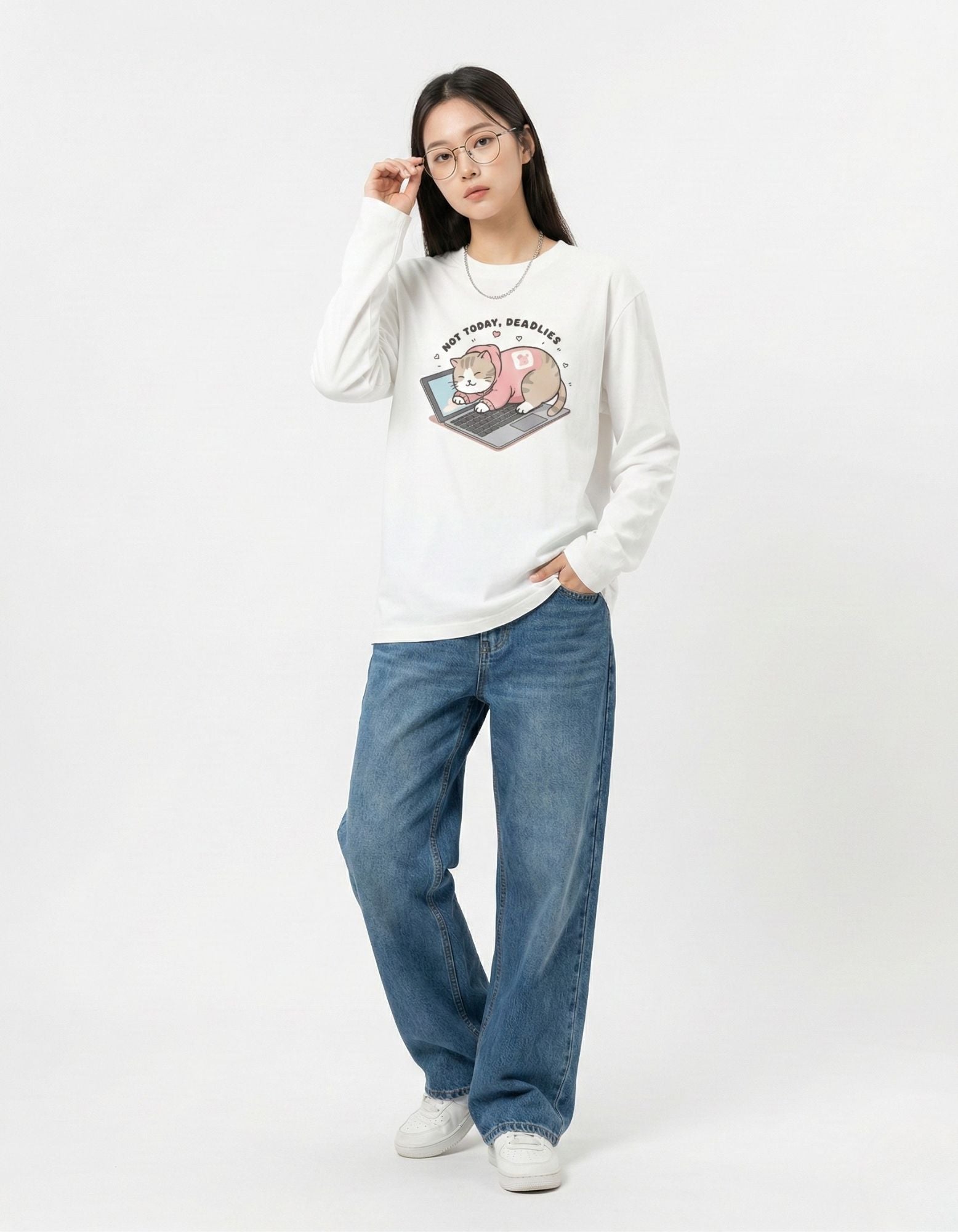 Front view of a woman in a GENZs Fashion white graphic tee with a cute cat illustration, perfect for the "soft girl" aesthetic in India.