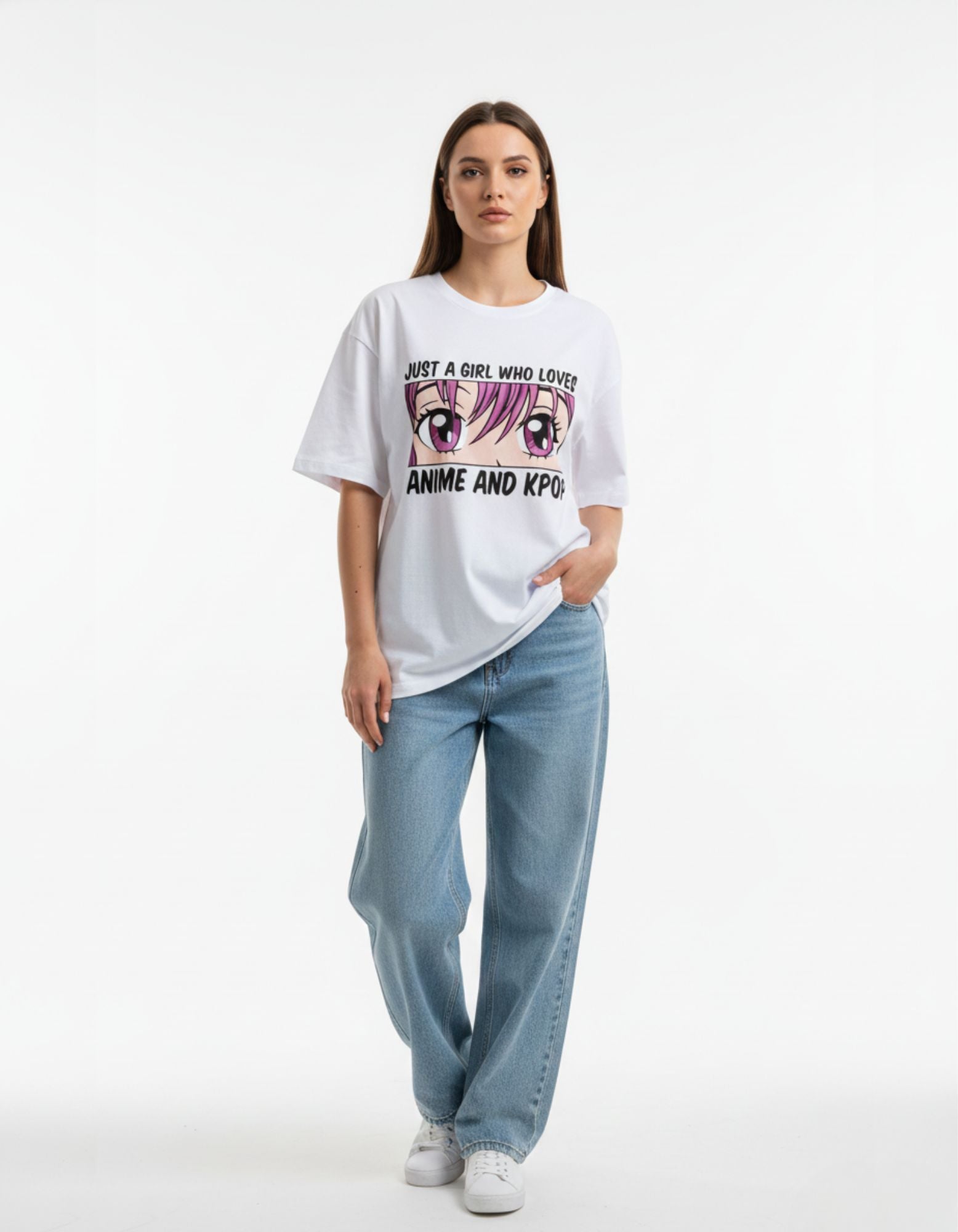 White oversized t-shirt for girls featuring "Just a girl who loves Anime and Kpop" with pink manga eyes graphic.