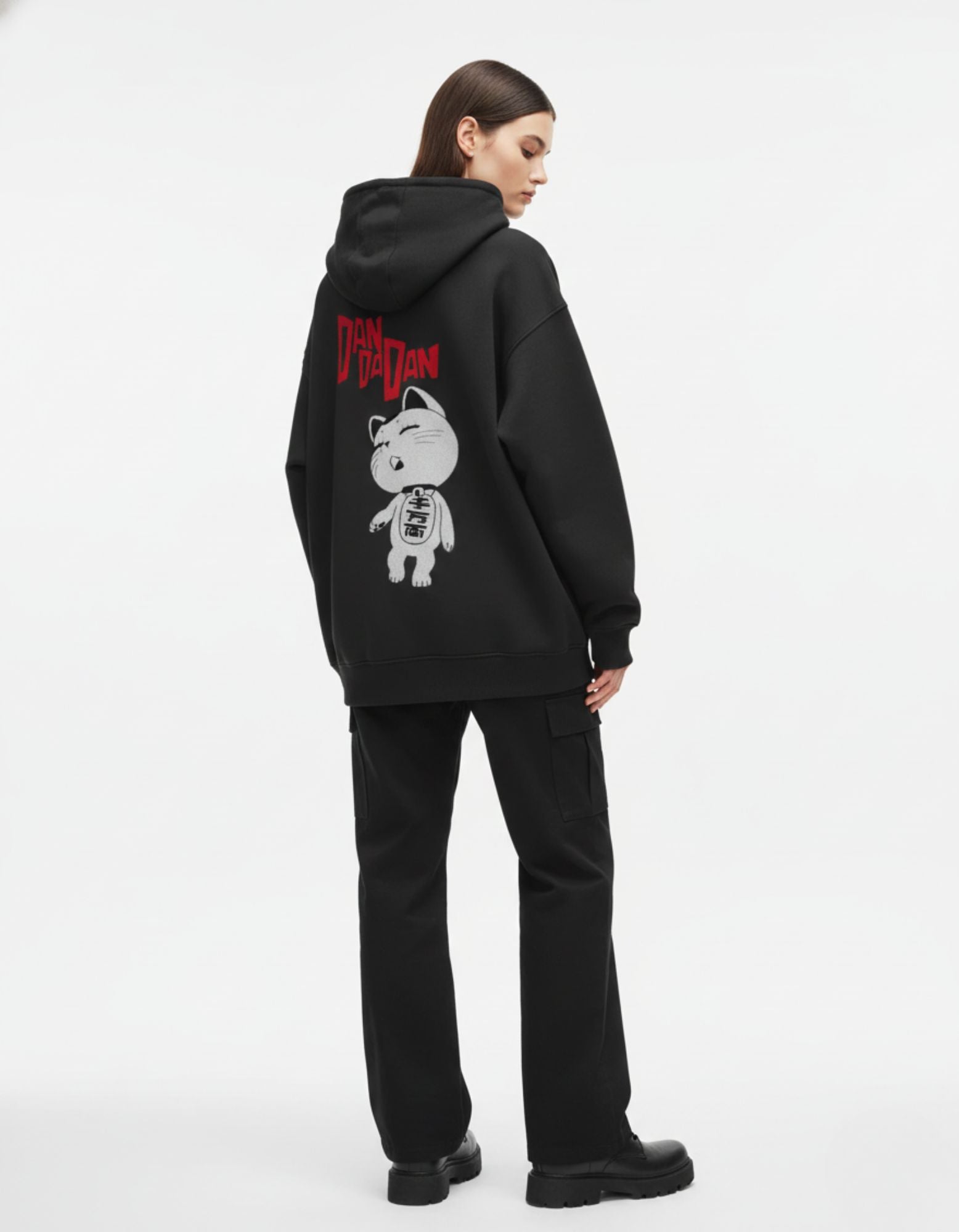GENZs Fashion black oversized hoodie featuring the Dandadan cat graphic and red text on the back, anime streetwear for women.