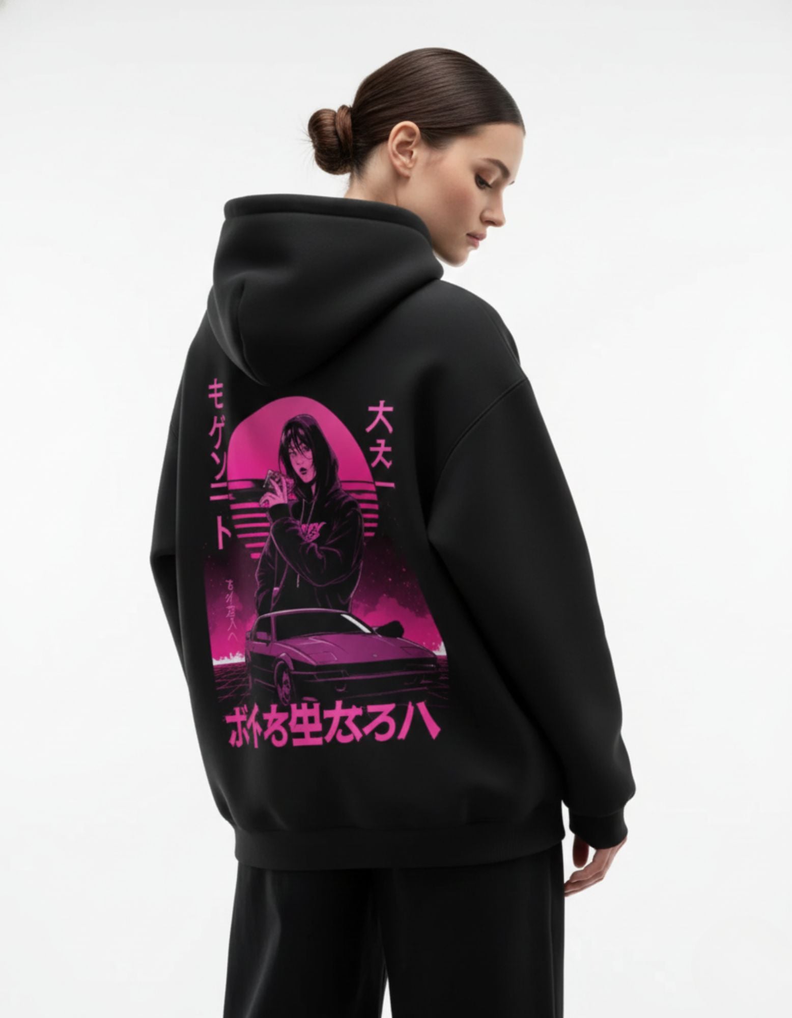 Angled back view of black oversized hoodie featuring anime artwork
