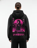 Back full view of black oversized hoodie with anime graphic print
