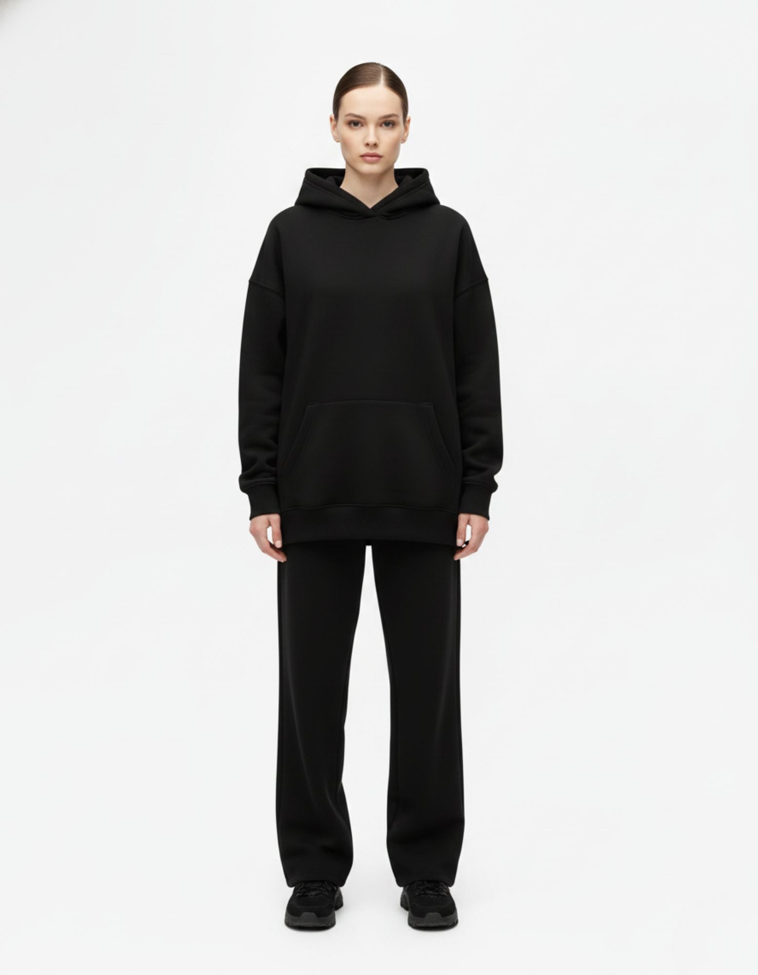 Front full view of black oversized hoodie with clean minimalist design
