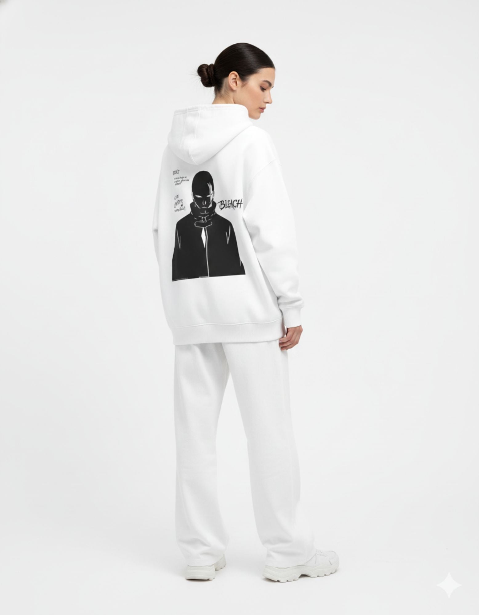 Female model showcasing the full Bleach anime back graphic on a white oversized GENZs Fashion hoodie.