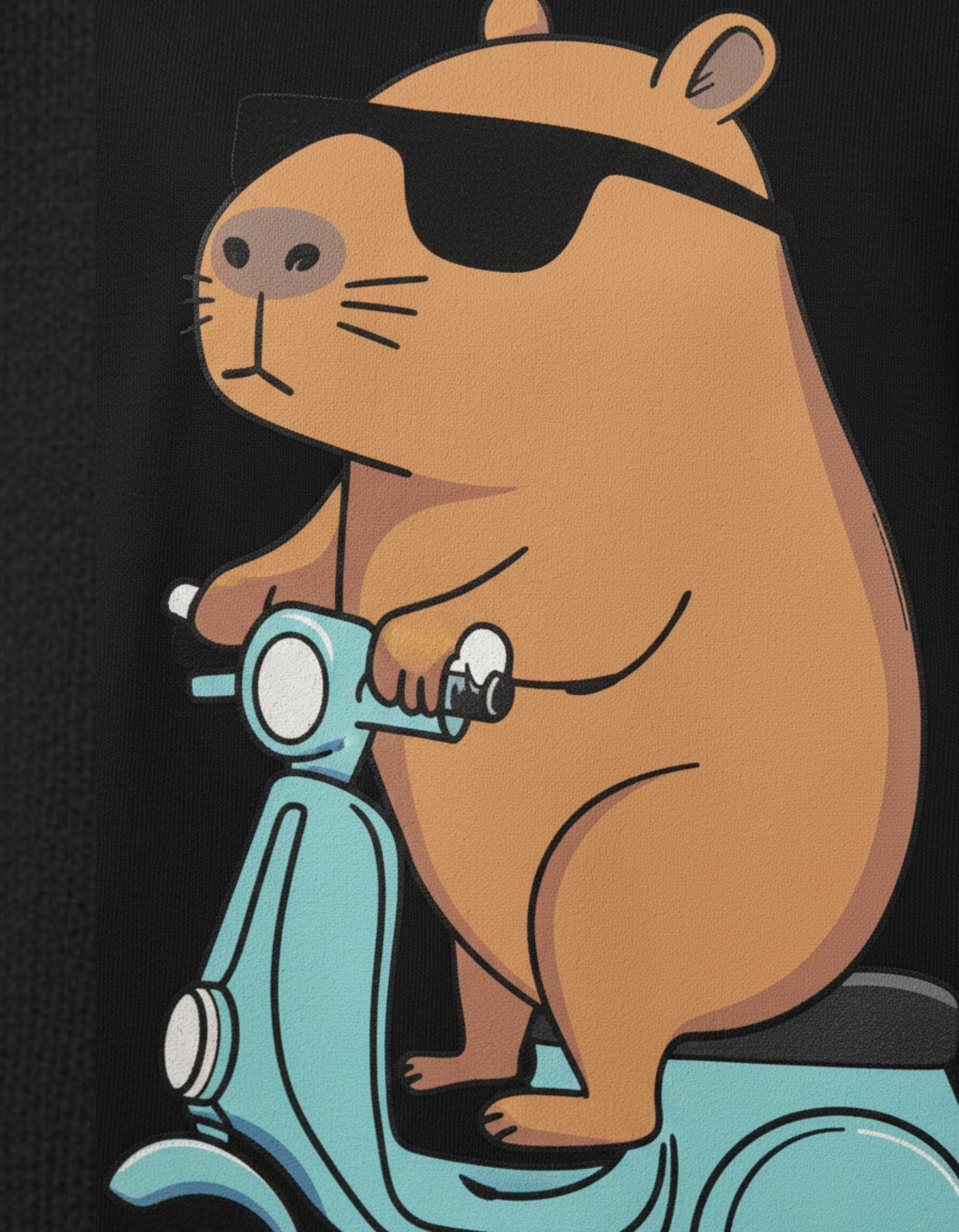 High-quality close-up detail of the "Just Be Cool" capybara on a blue scooter graphic print for a streetwear brand.