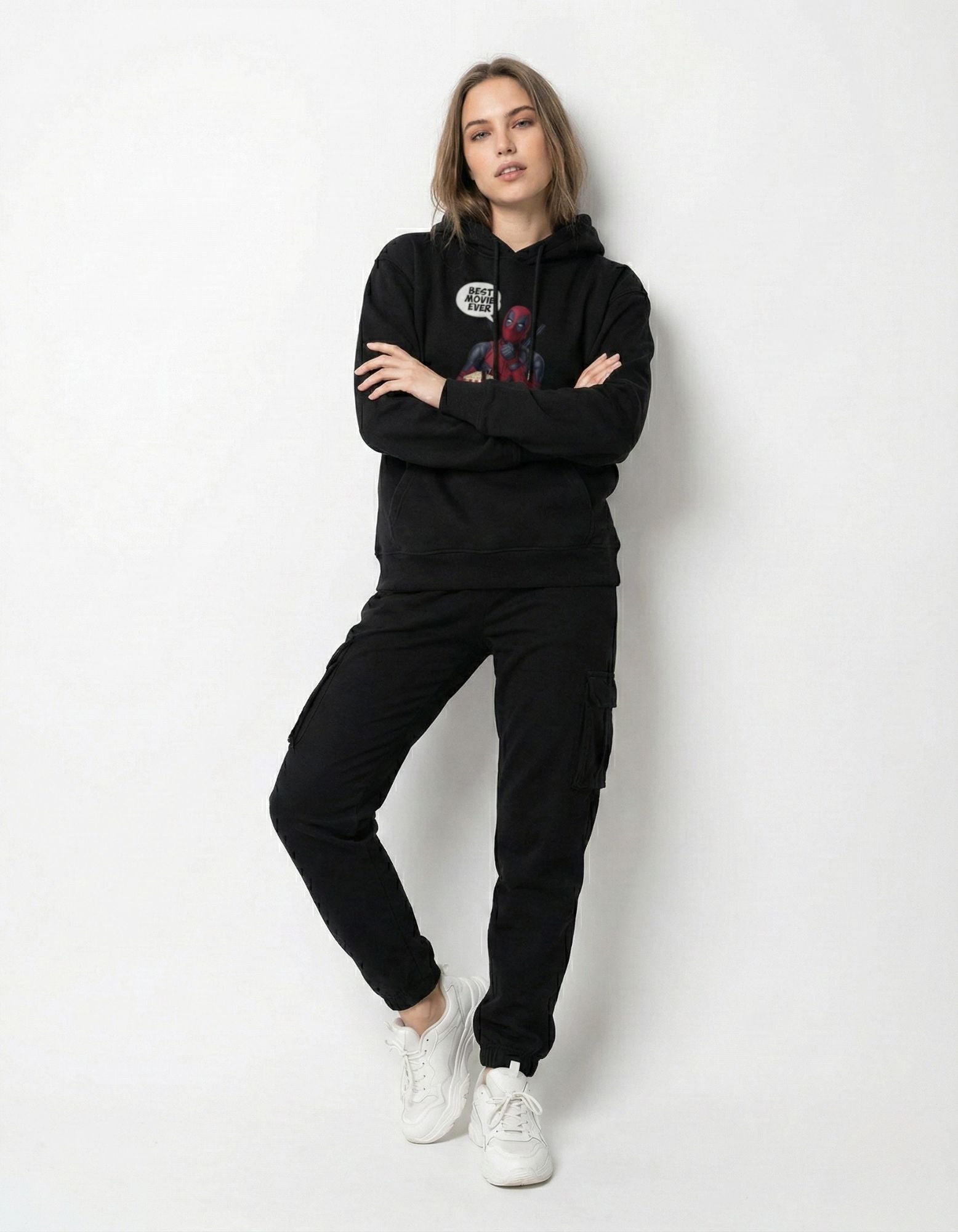 Female model wearing the "Best Movie Ever" Deadpool popcorn graphic hoodie in black.