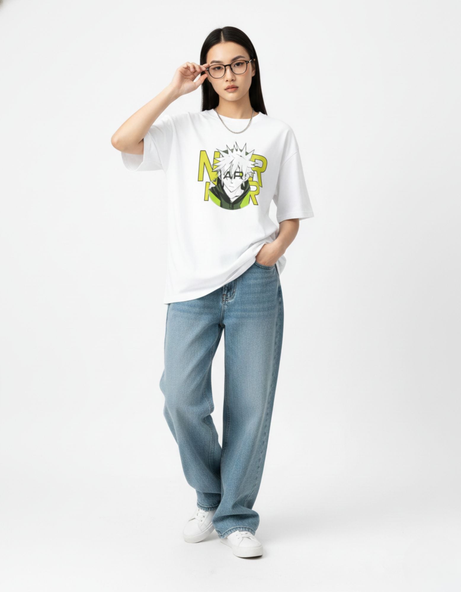 "Female model wearing an oversized white anime graphic t-shirt and baggy blue jeans from the GENZs Fashion streetwear collection."