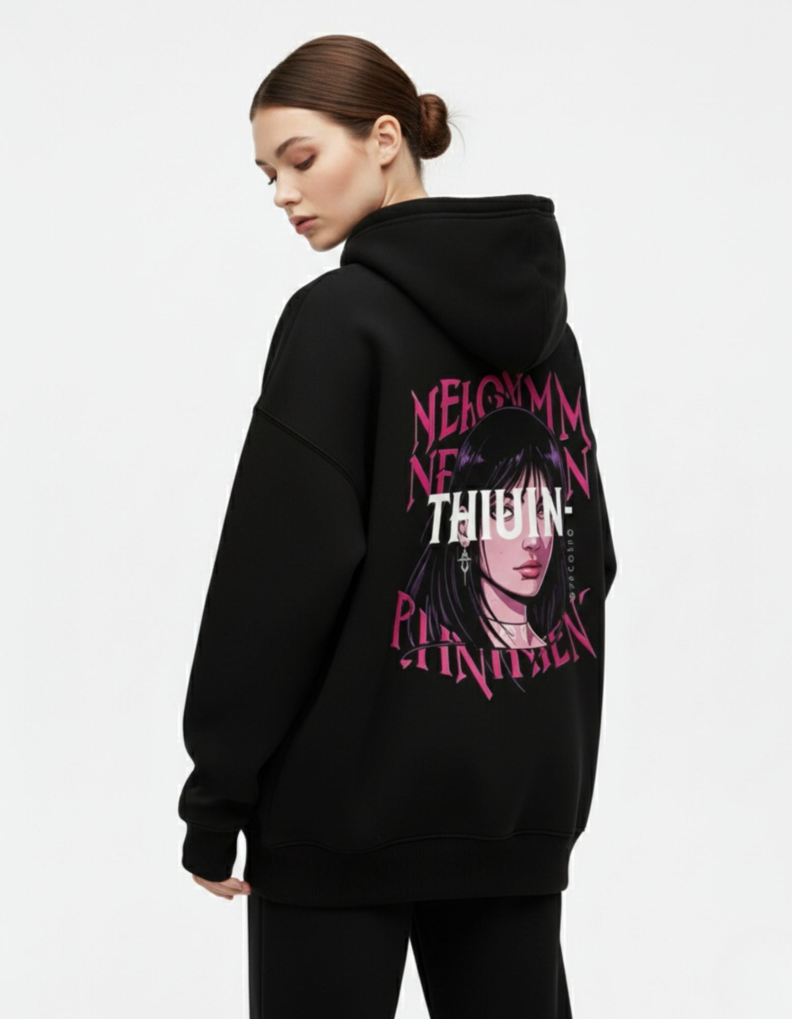 Rear view of a female model wearing a black GENZs Fashion hoodie featuring a pink and white anime girl graphic and "THIUN-" text.