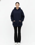 Front view of a premium navy blue oversized hoodie for women, featuring a cozy streetwear fit and drop-shoulder design from GENZs Fashion.