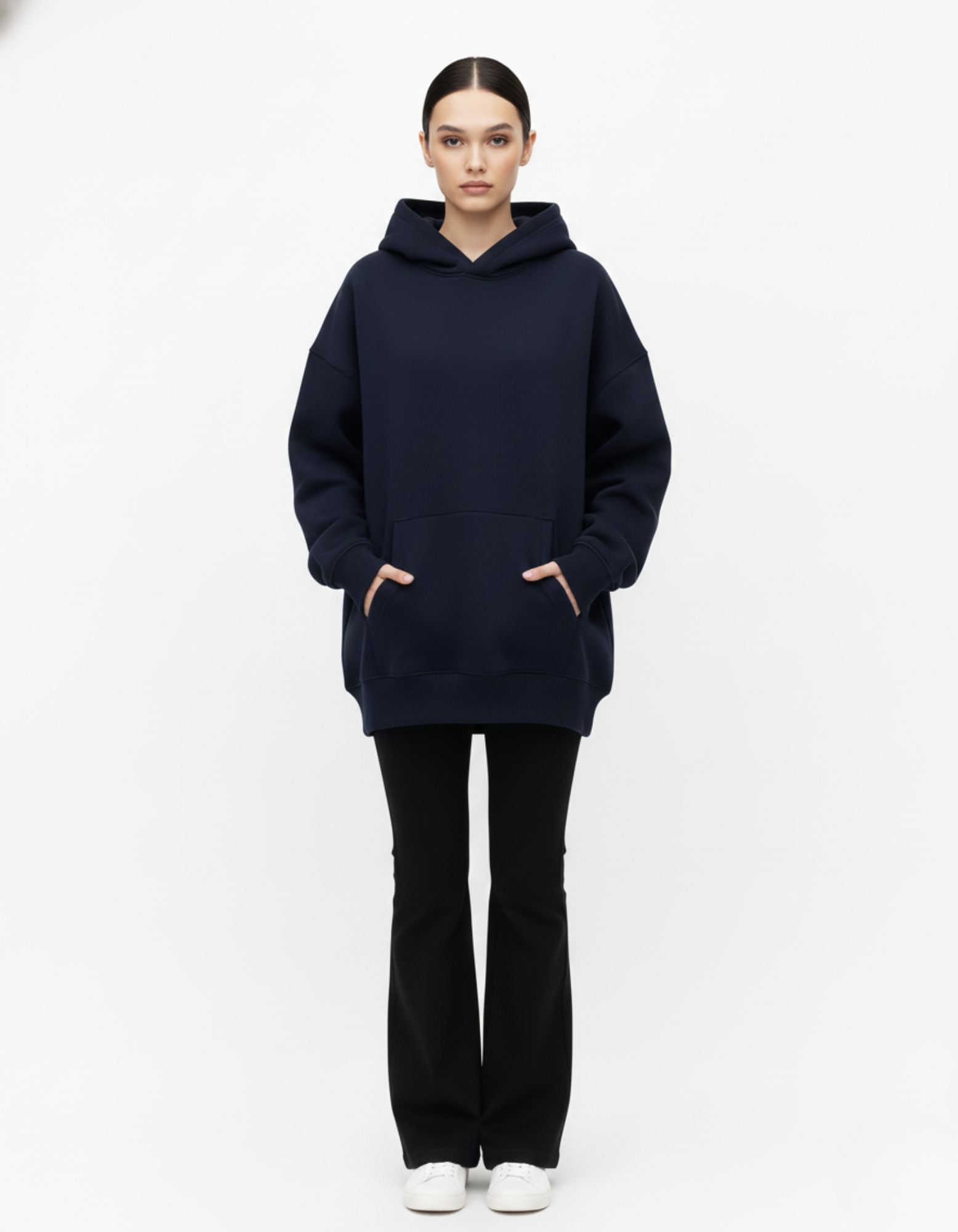 Front view of a premium navy blue oversized hoodie for women, featuring a cozy streetwear fit and drop-shoulder design from GENZs Fashion.