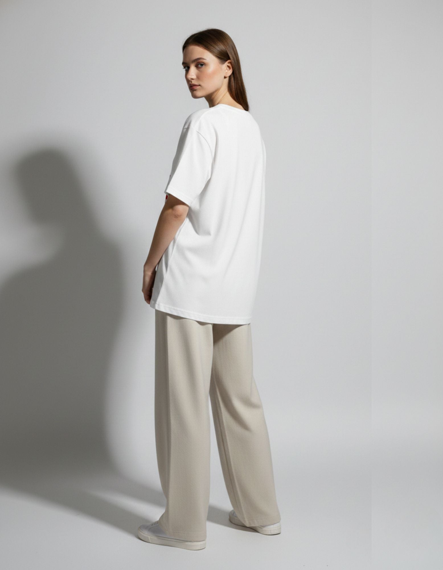 GENZs Fashion aesthetic white graphic baggy shirt for women, perfect for college fests and casual streetwear in India.