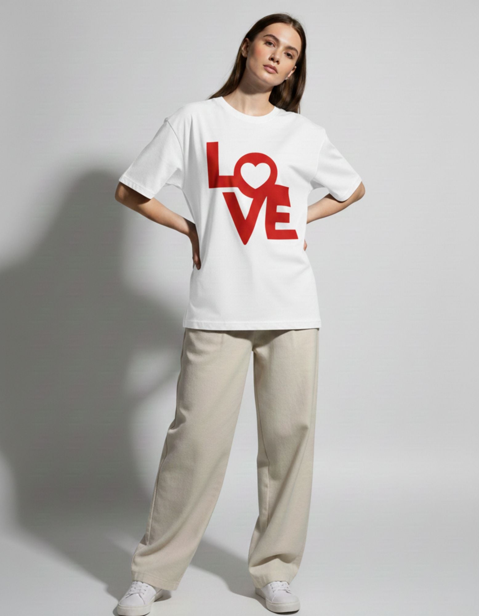Side view of GENZs Fashion white oversized streetwear t-shirt, showcasing the premium loose fit and clean lines.