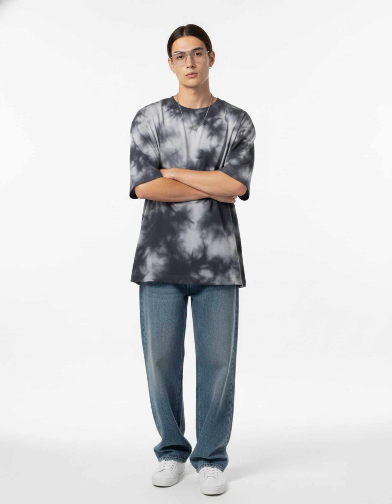 "Men's oversized gray and black tie-dye graphic tee, trendy drop shoulder streetwear for a bold urban look."
