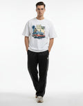 Men wearing white GTA V inspired oversized graphic t-shirt, premium gaming merchandise India.