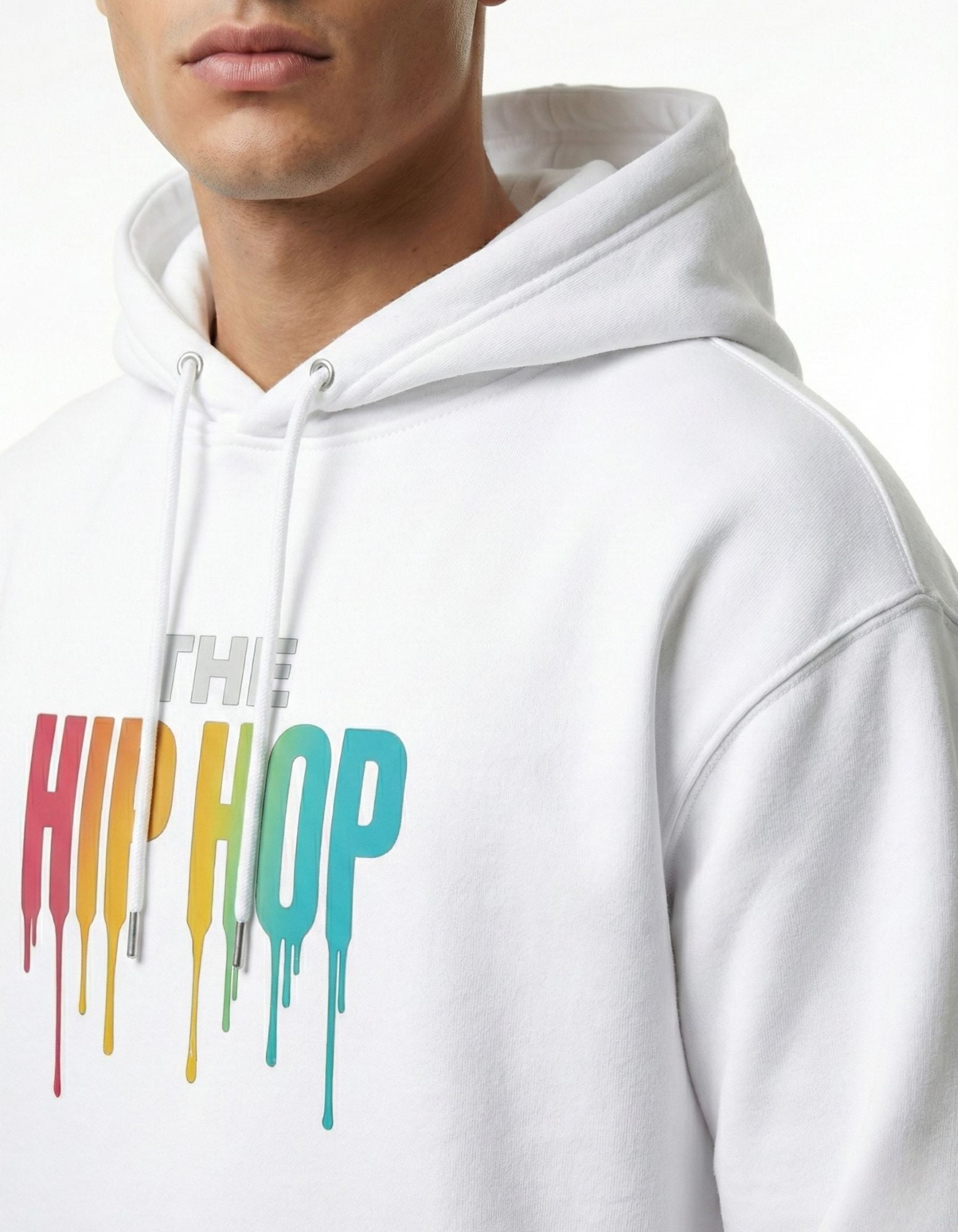 Close-up detail of the high-definition colorful drip logo on a white heavyweight cotton hoodie.