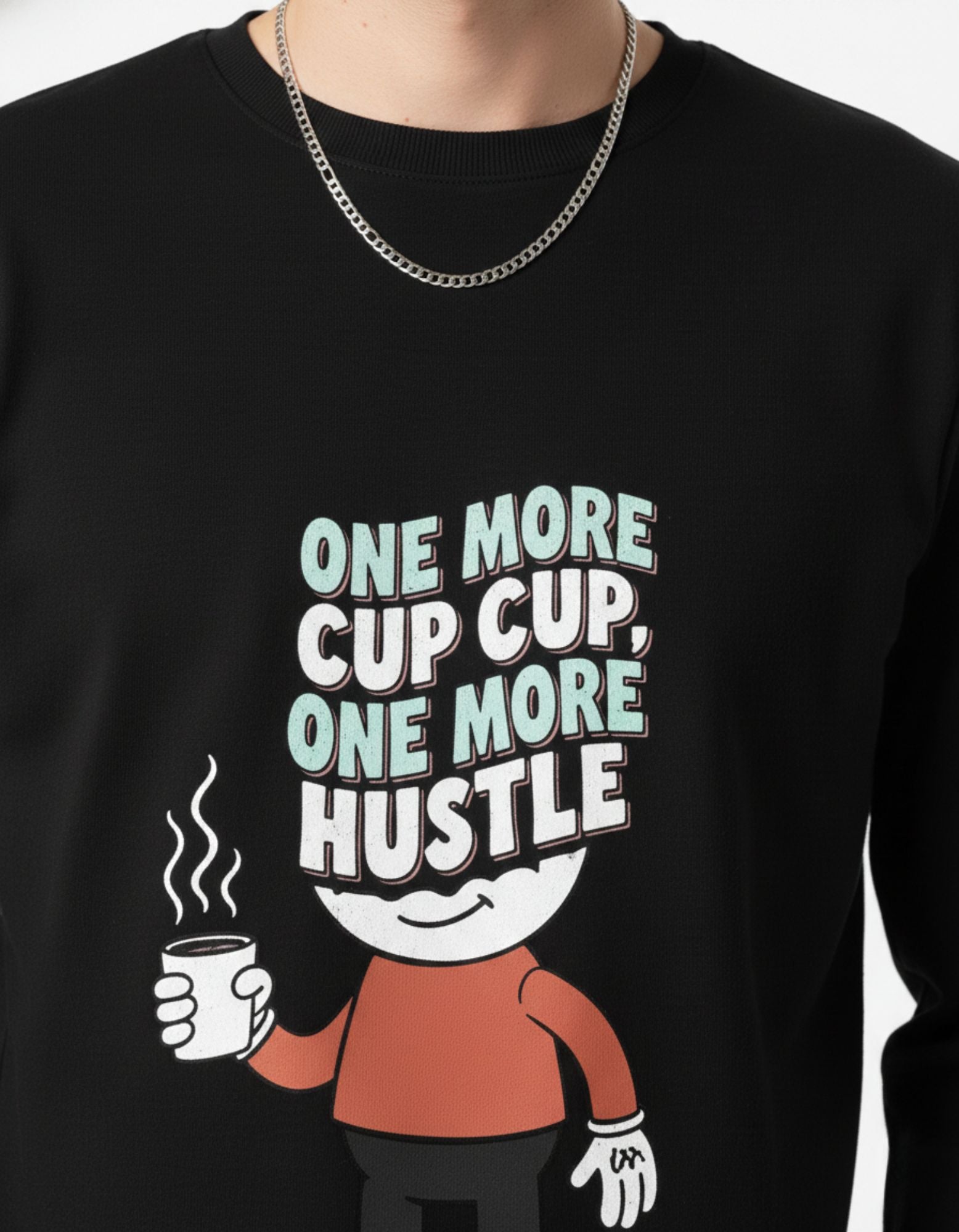 Close-up of GENZs Fashion black sweatshirt featuring "One More Cup, One More Hustle" 3D-style typography and coffee graphic for the minimalist hustler trend in India.