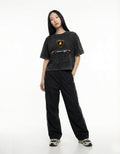 Women's vintage washed black t-shirt featuring a Lamborghini supercar graphic, a top choice for premium automobile fans in India.