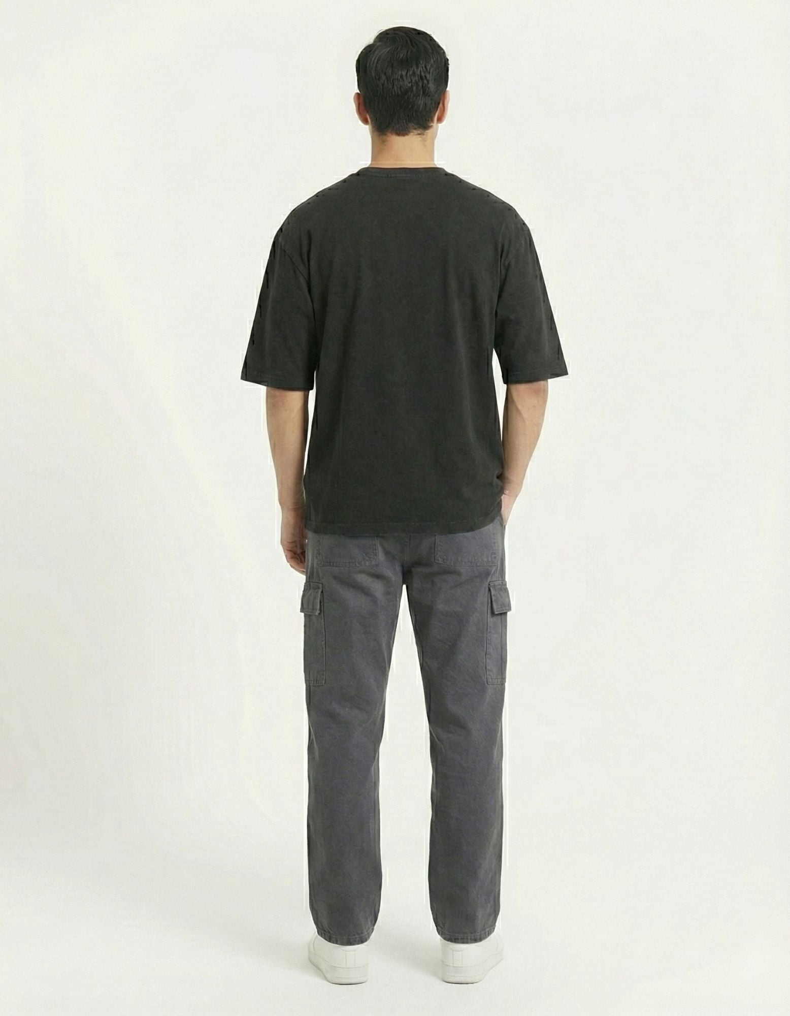 Clean back view of a GENZs Fashion black oversized t-shirt, showing the minimalist finish and high-quality 240 GSM cotton material.