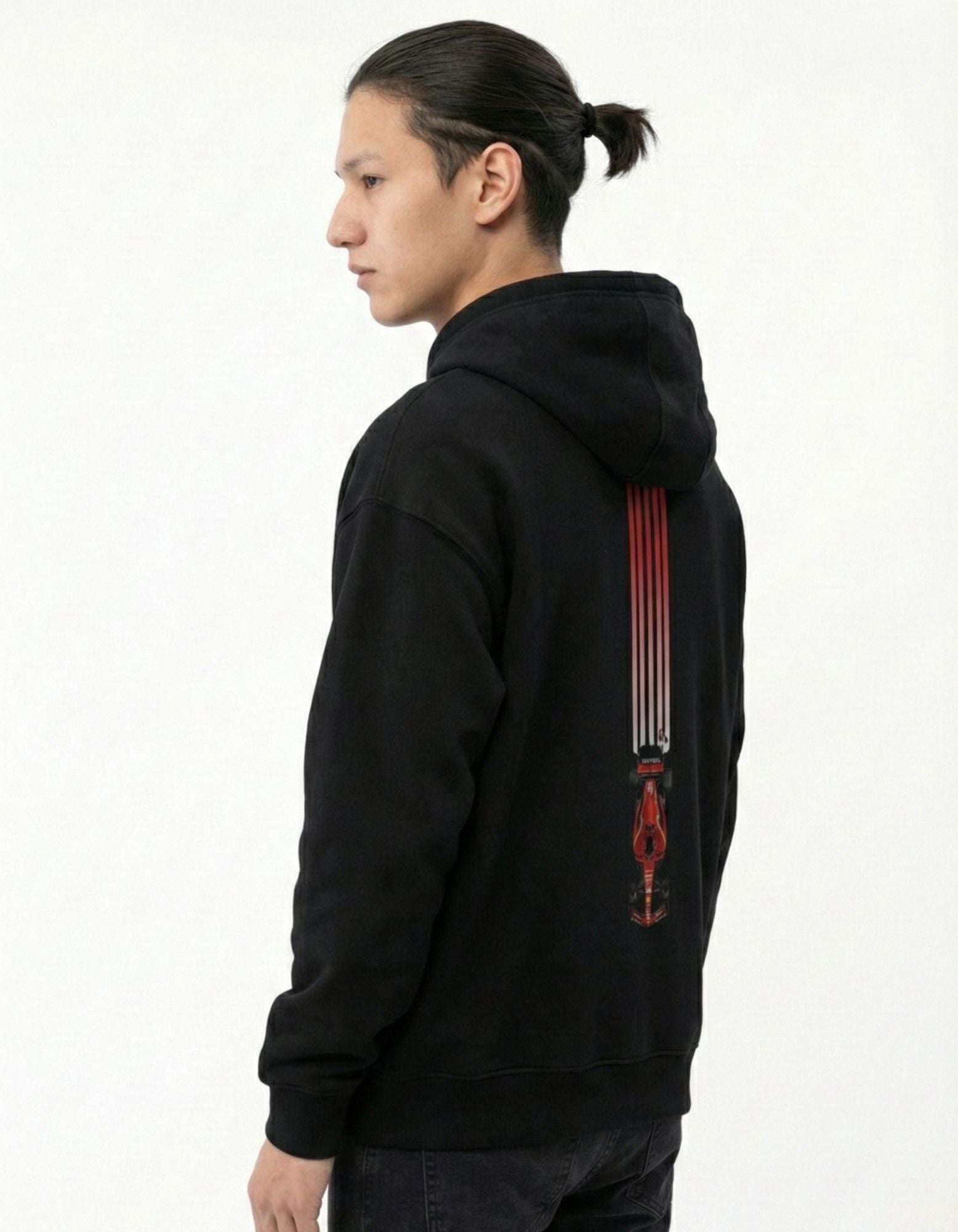 Side profile of male model in a black oversized racing hoodie from GENZs Fashion, high-quality cotton streetwear.