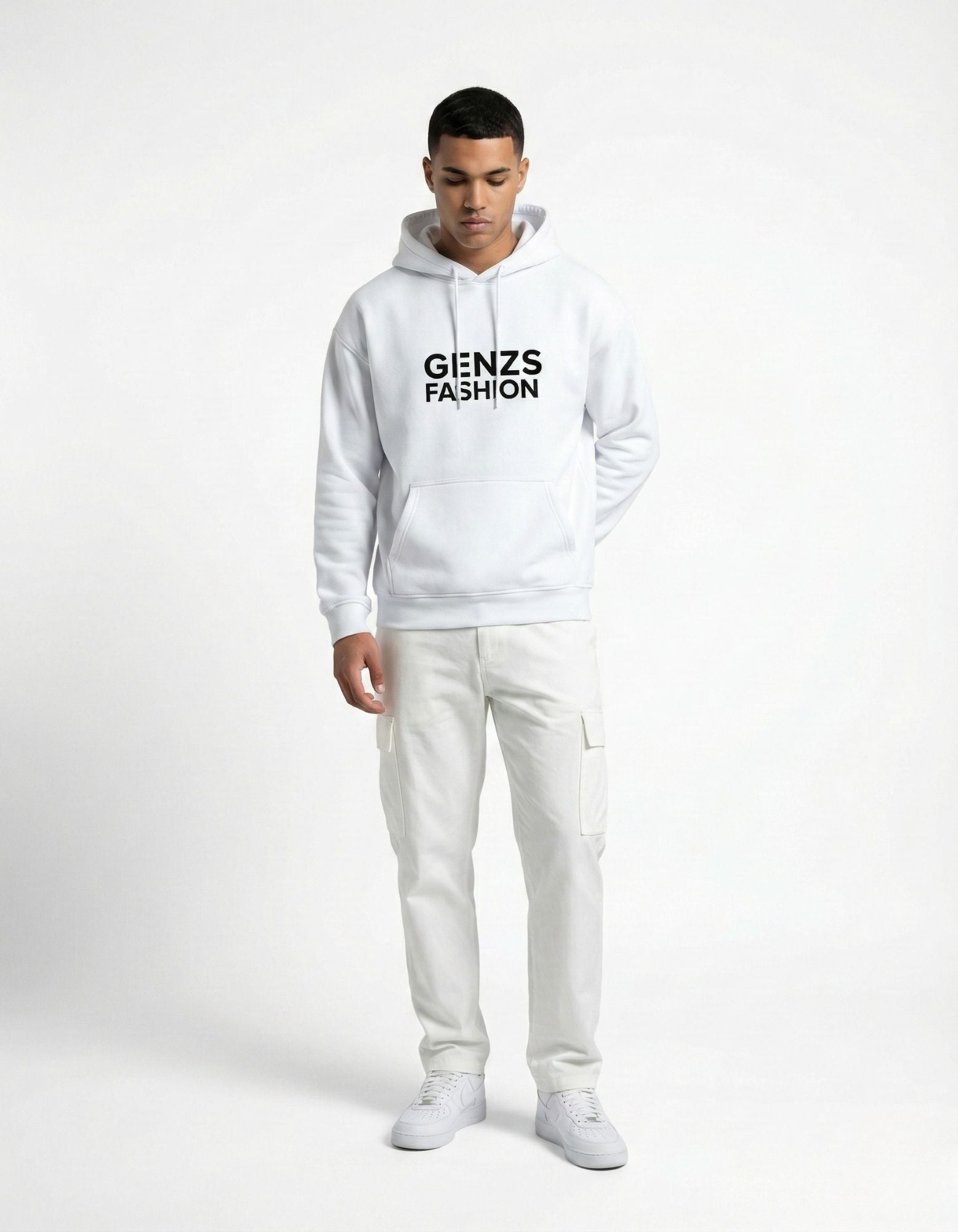 Full-length front shot of a woman in a GENZs FASHION white hoodie and black skirt.