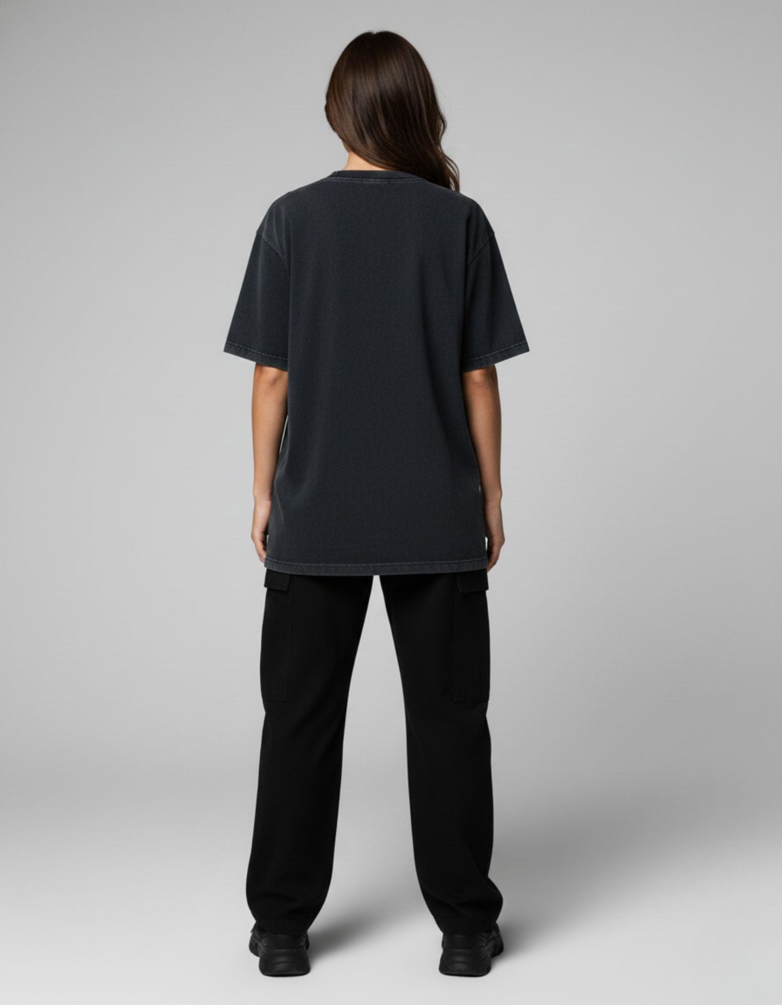 Back view of a premium oversized black t-shirt from GENZs Fashion showcasing the loose drop-shoulder fit popular in India.