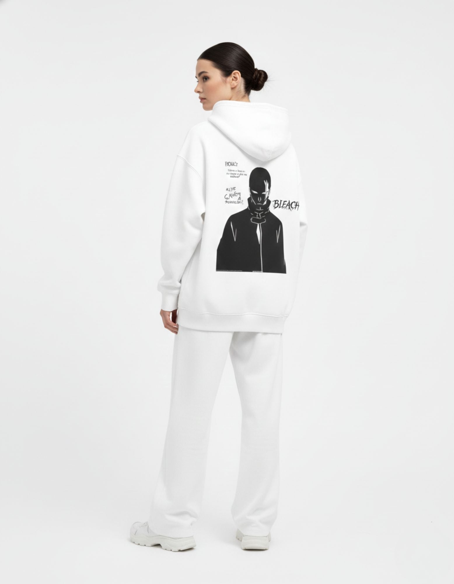 Back view of GENZs Fashion white hoodie featuring a black Bleach anime graphic, oversized streetwear style for women.
