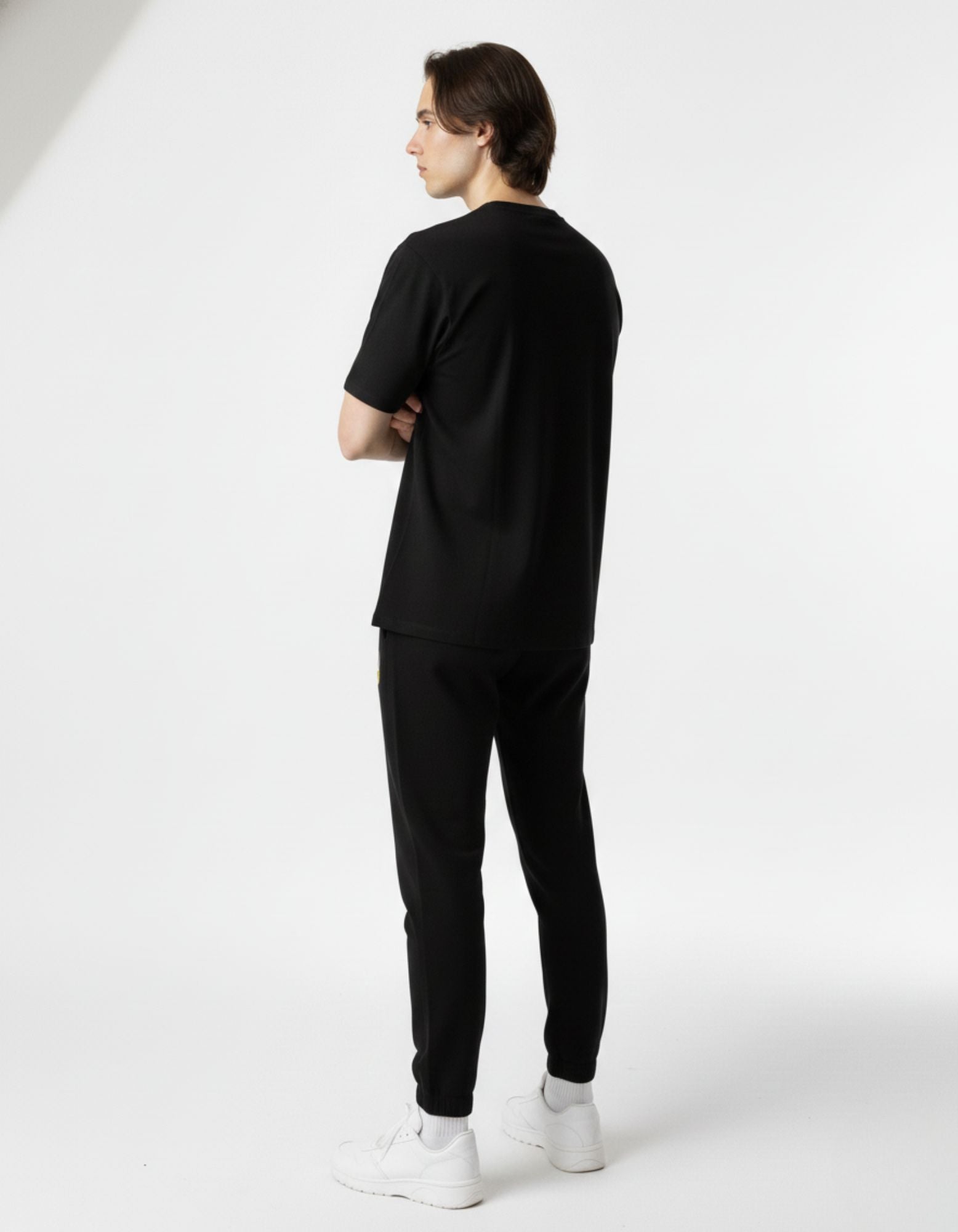 Back view of a black oversized t-shirt for men, showcasing the high-quality fabric of GENZs Fashion.