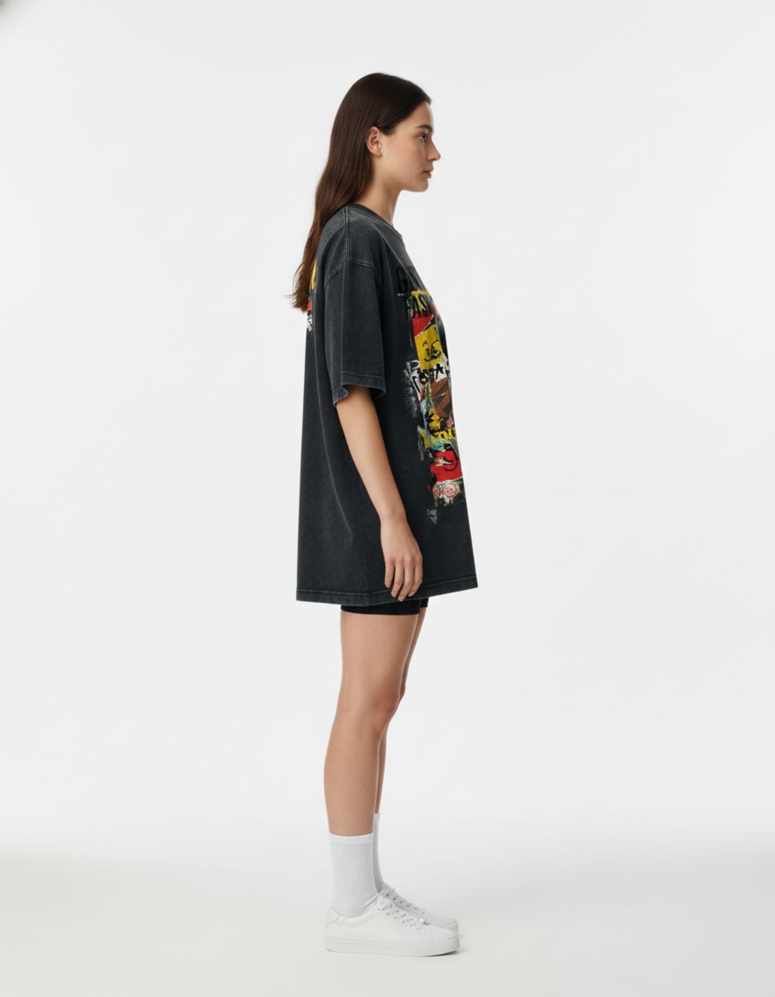 Side view of the GENZs Fashion oversized boxy fit streetwear t-shirt highlighting the dropped shoulder and vintage black wash.