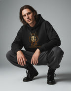 Close lifestyle view of black oversized hoodie with front graphic design