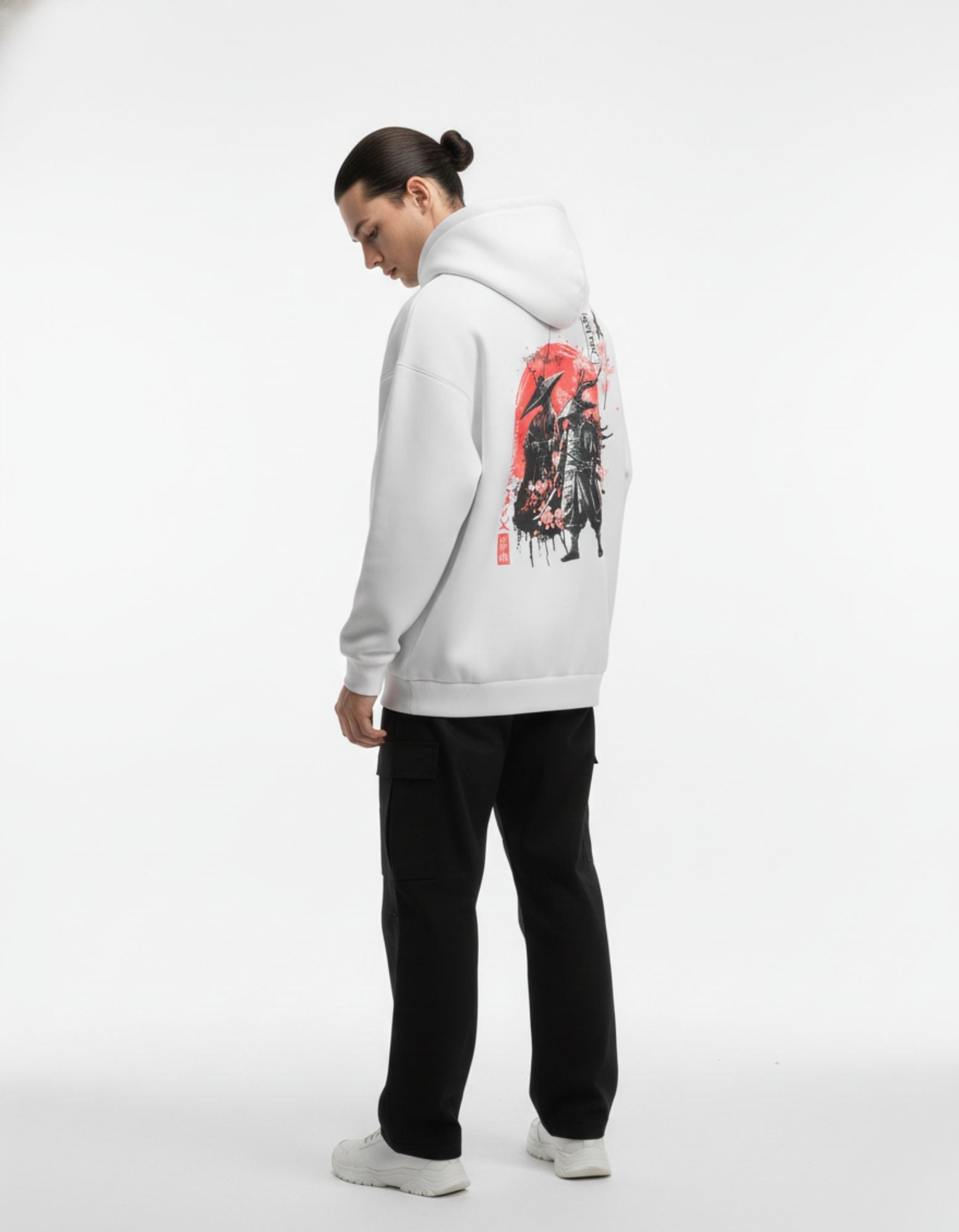 Angled back view of light grey oversized hoodie showing samurai anime artwork
