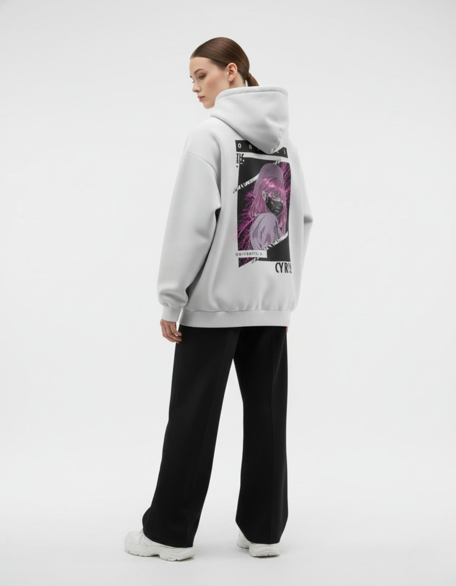 Three quarter back view of light grey oversized hoodie with anime artwork
