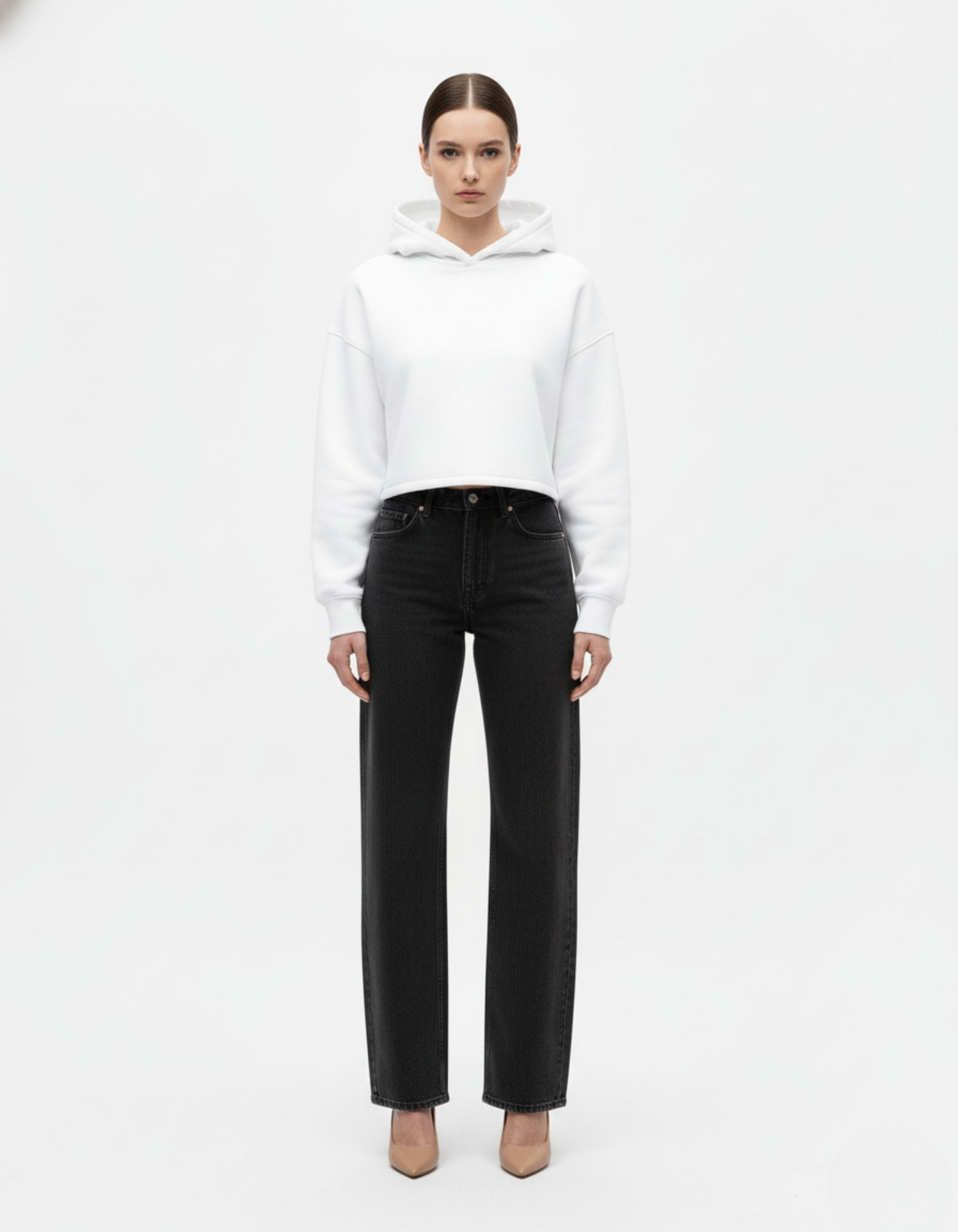 Front view of white oversized hoodie with clean minimalist design
