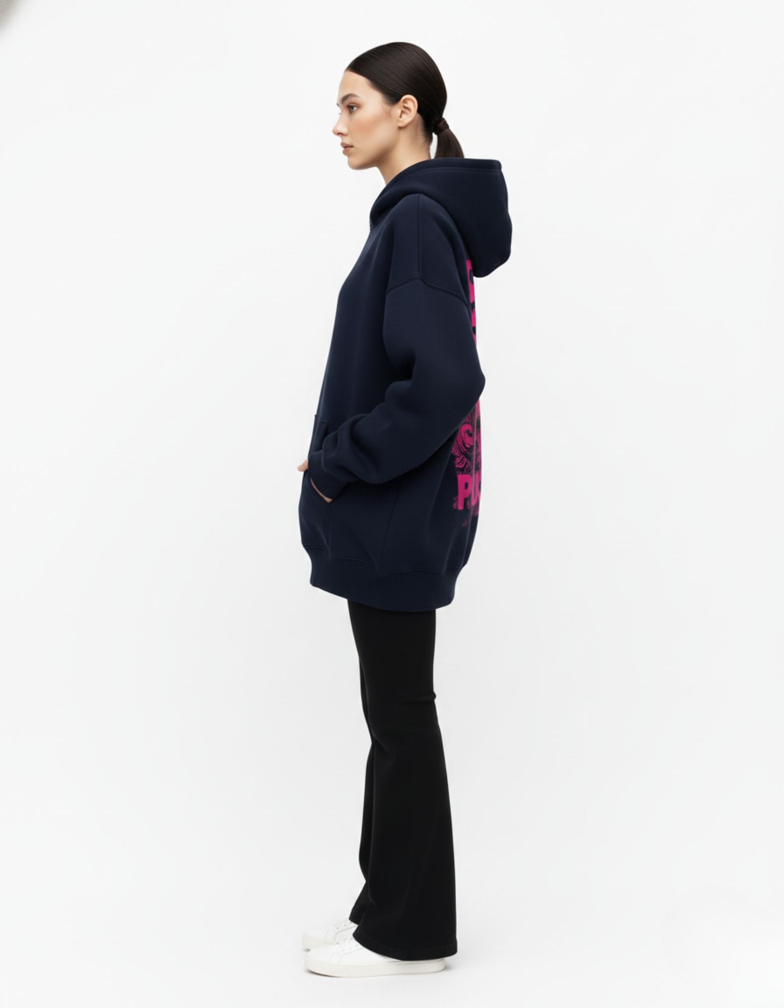 Side profile of a model wearing a GENZs Fashion oversized navy hoodie, highlighting the baggy aesthetic and high-quality fabric for Gen Z streetwear.