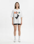 Front view of white oversized t-shirt with pixel art dinosaur graphic, trendy 8-bit streetwear for Indian gamers.