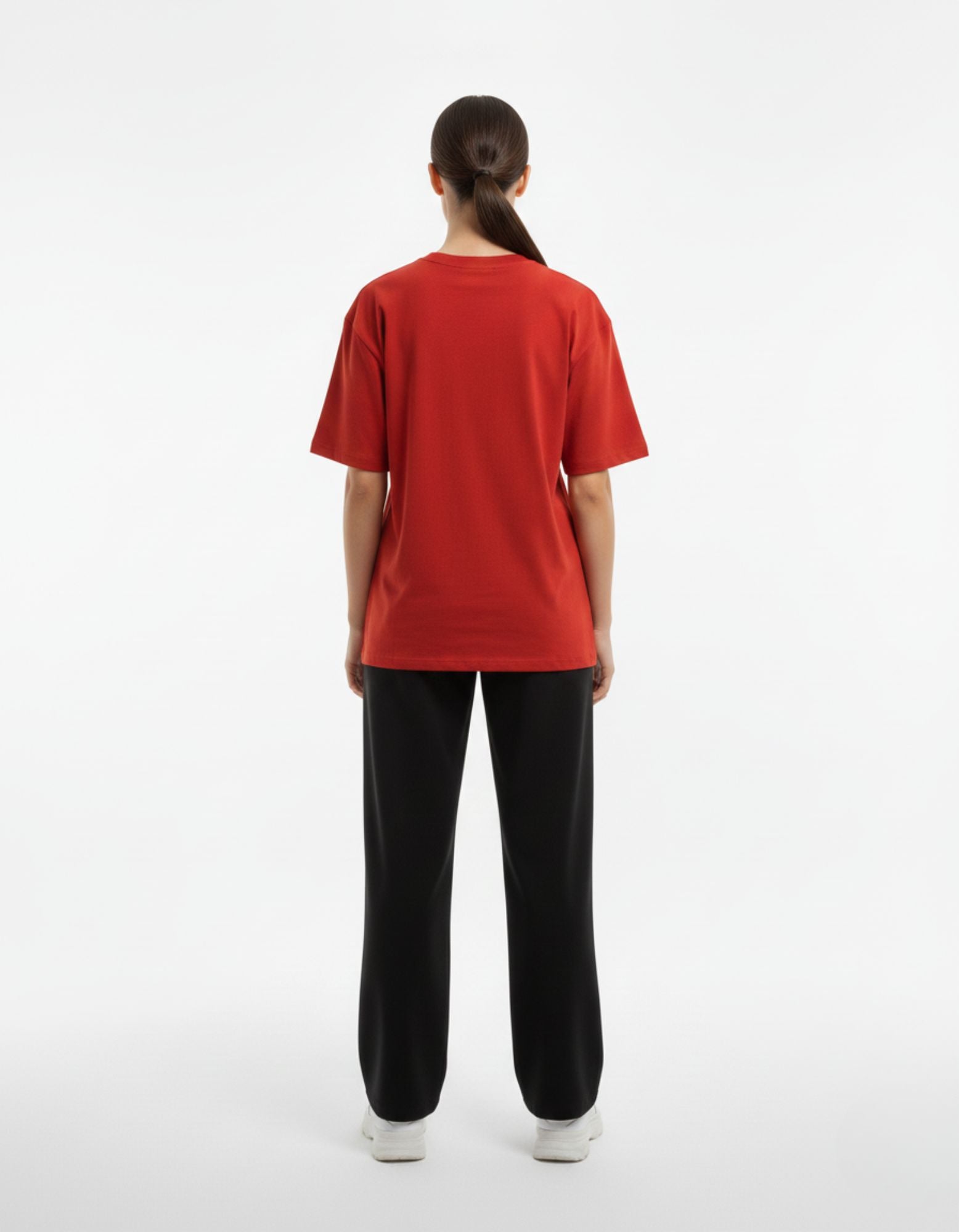 Rear view of the red oversized streetwear t-shirt showing the high-quality cotton fabric and relaxed unisex fit.