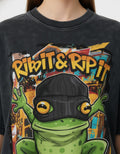 Close-up of the "RIBIT & RIP IT" frog on a skateboard graphic on a vintage charcoal streetwear t-shirt from GENZs Fashion.