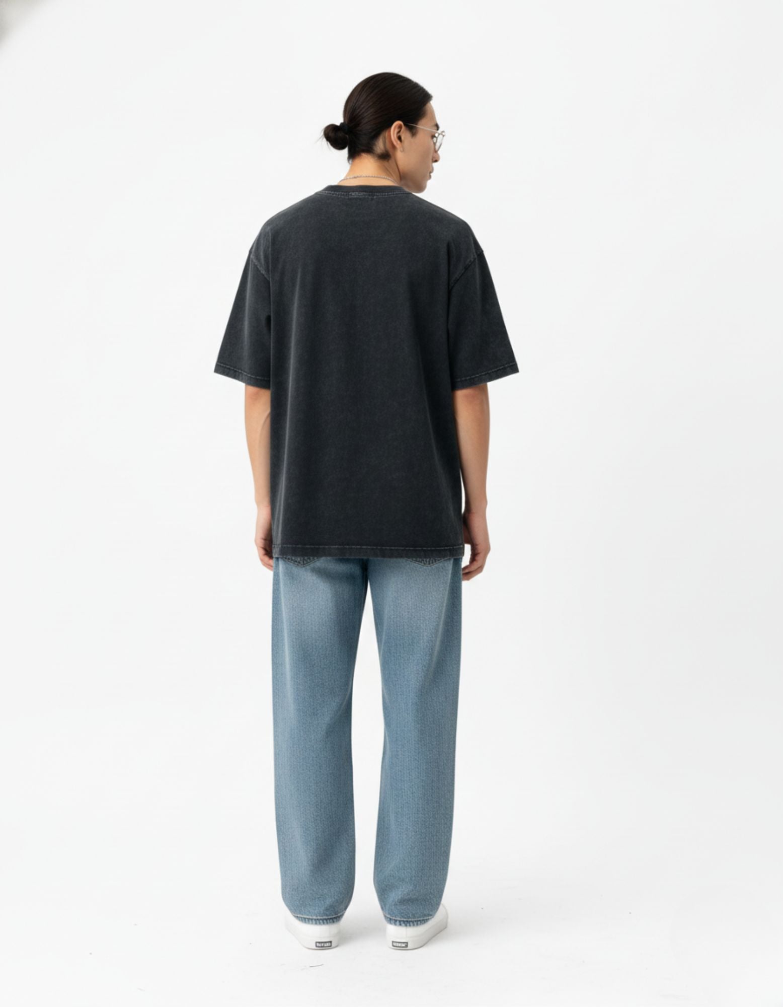 Rear view of the unisex vintage charcoal streetwear tee by GENZs Fashion, showing the premium faded wash and loose fit.