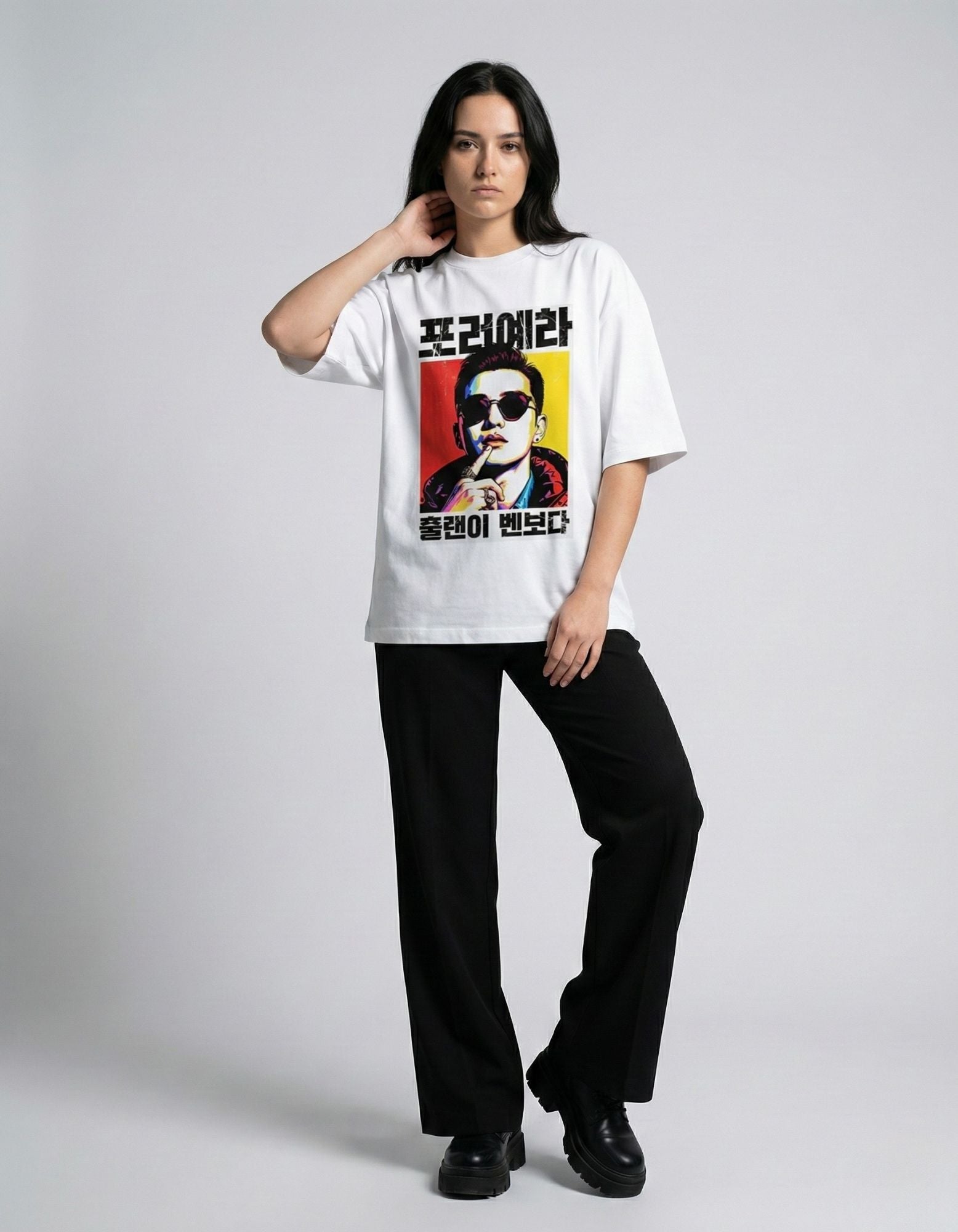 "Front view of unisex white oversized tee with Korean pop art for women, trendy baggy fashion."