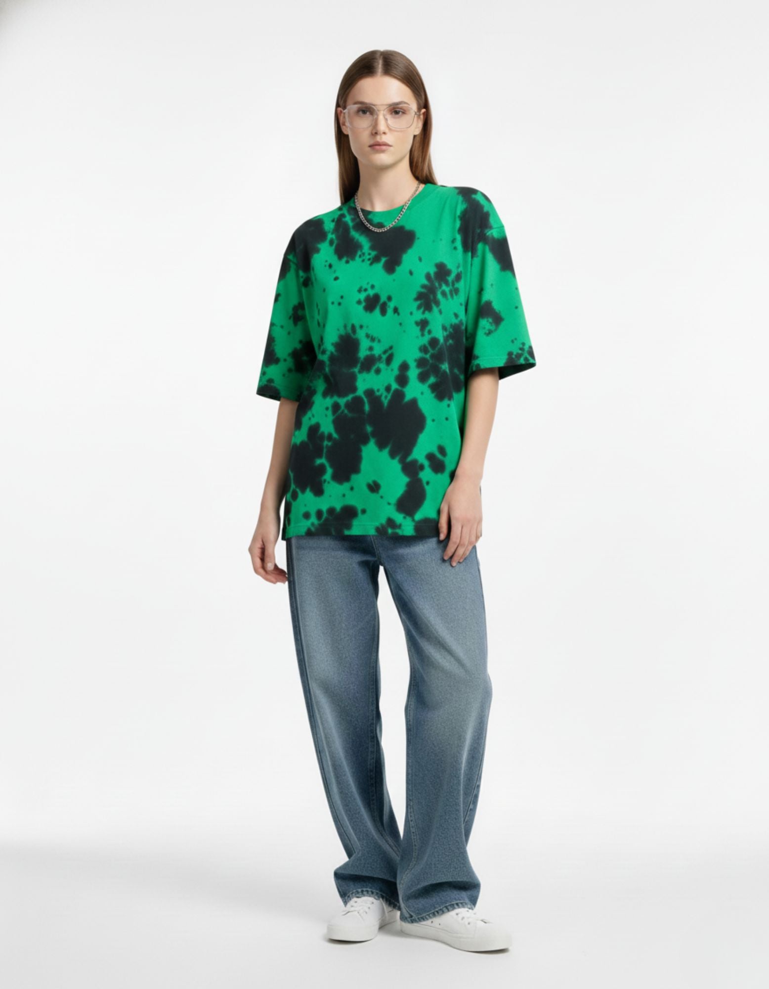 "Women's oversized green and black tie-dye t-shirt, premium baggy streetwear for urban fashion in India."