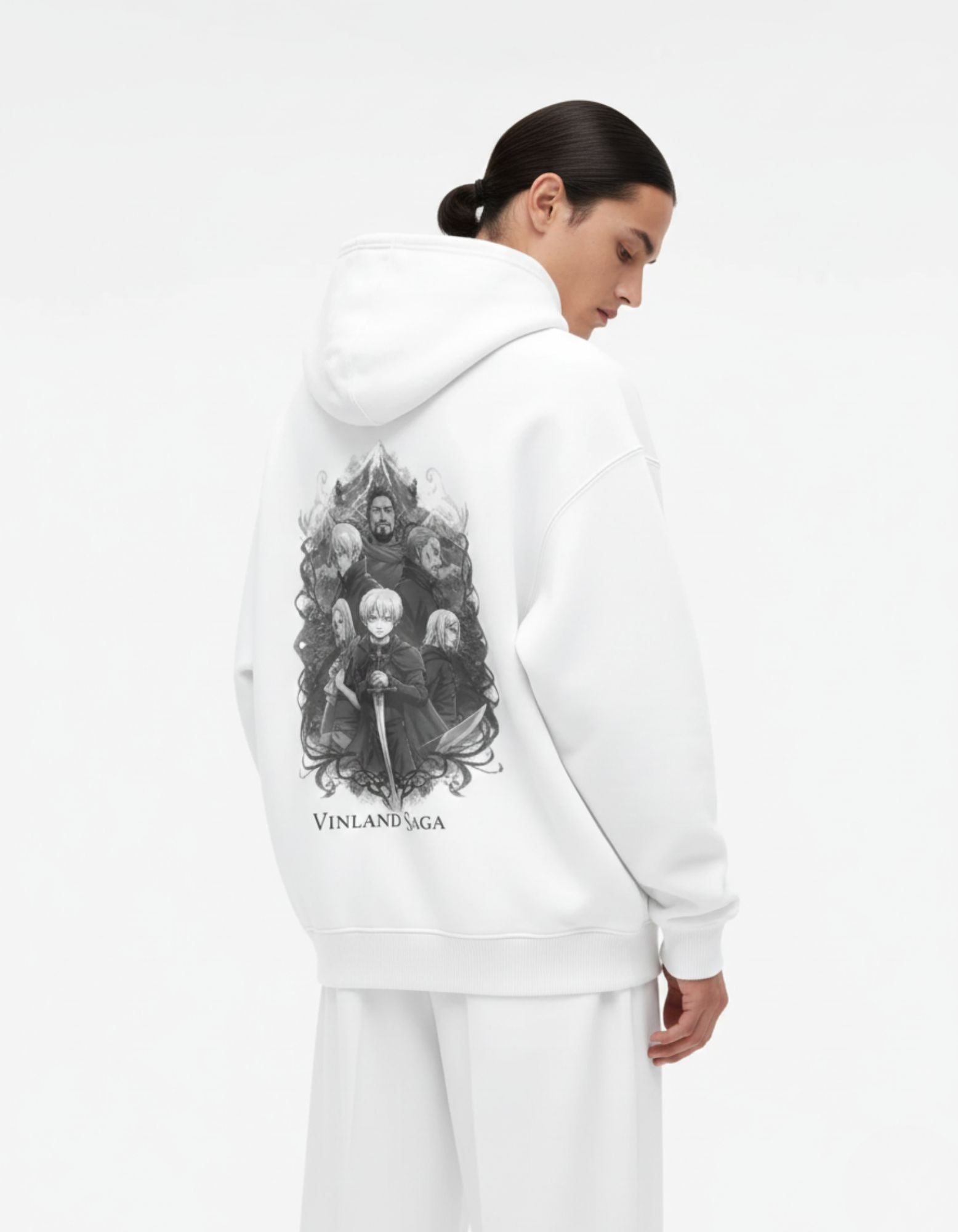 Male model from the back wearing a white Vinland Saga hoodie with a detailed black-and-grey graphic of Thorfinn and Askeladd.