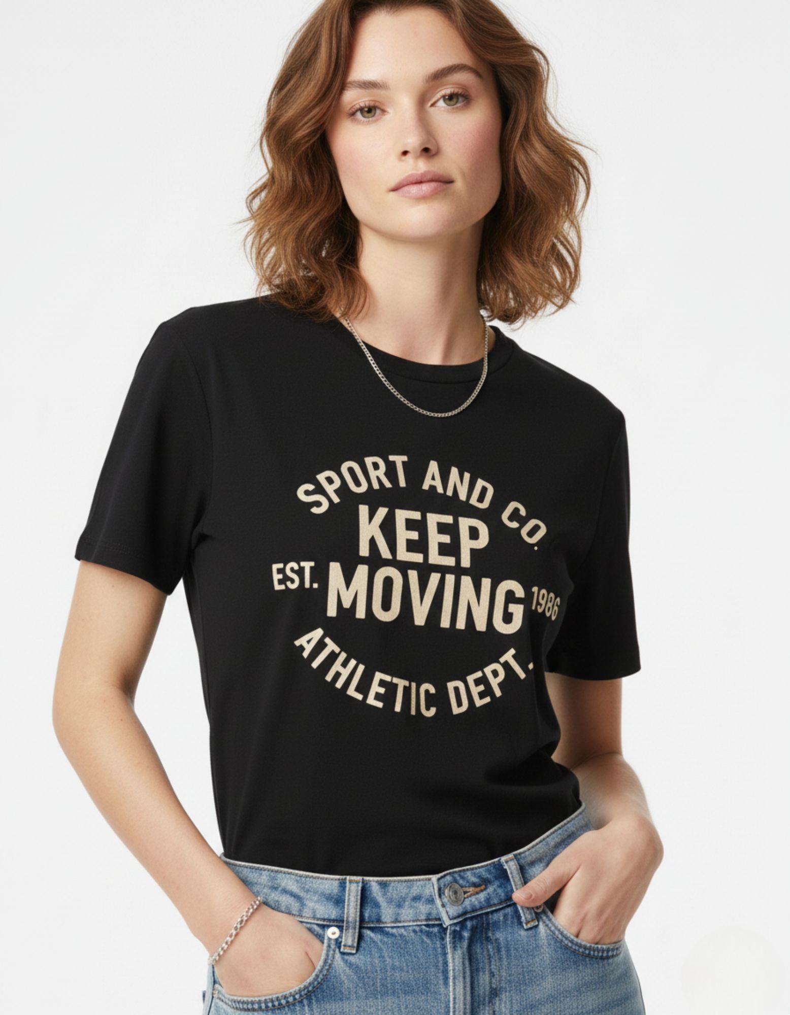 Back view of a premium black oversized t-shirt for women, showing a clean minimalist look and baggy fit.