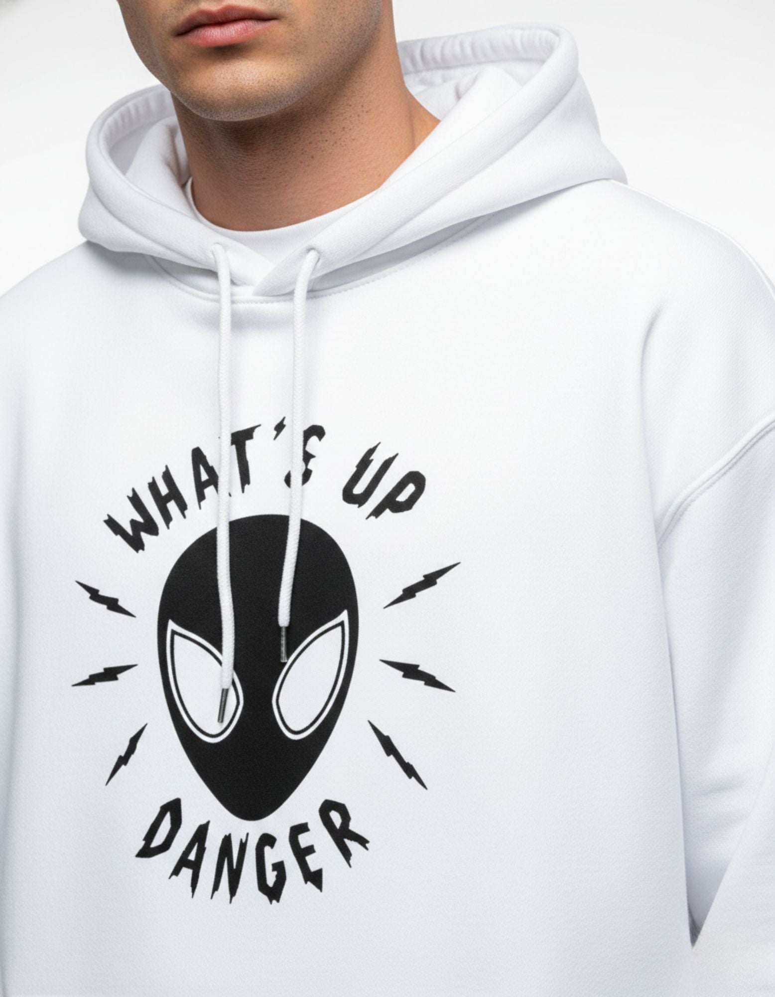 Close-up of the "What's Up Danger" spider logo print on a premium white heavyweight cotton hoodie.