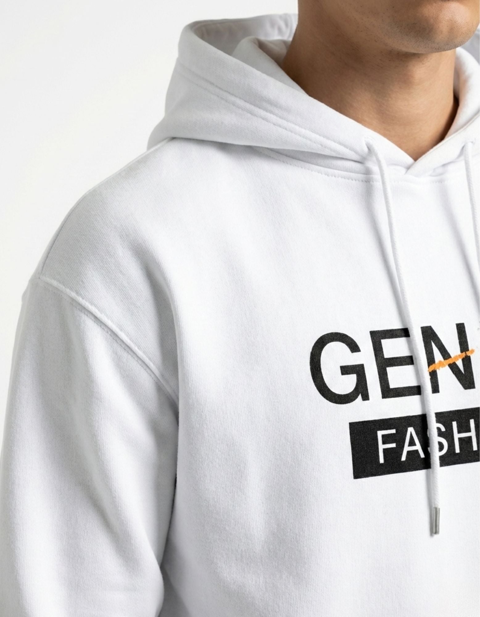Close-up detail of the GENZs Fashion minimalist logo printed on a premium white cotton streetwear hoodie.