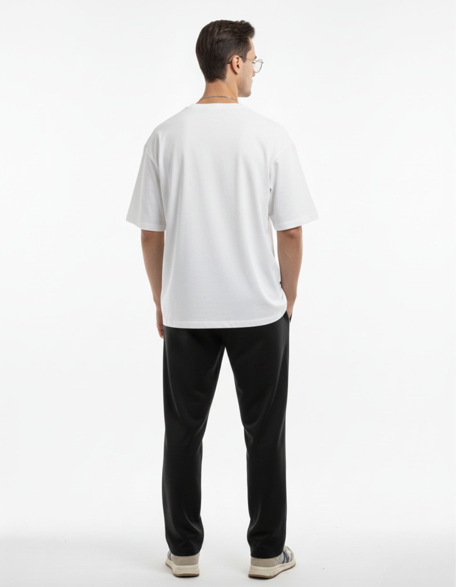 Back view of premium white oversized t-shirt for men, boxy fit streetwear India.
