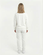 Rear view of a high-quality white unisex crewneck sweatshirt, highlighting the clean fit and breathable fabric.