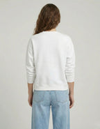 Back view of a white unisex crewneck sweatshirt, highlighting the clean, oversized fit and high-quality fabric.